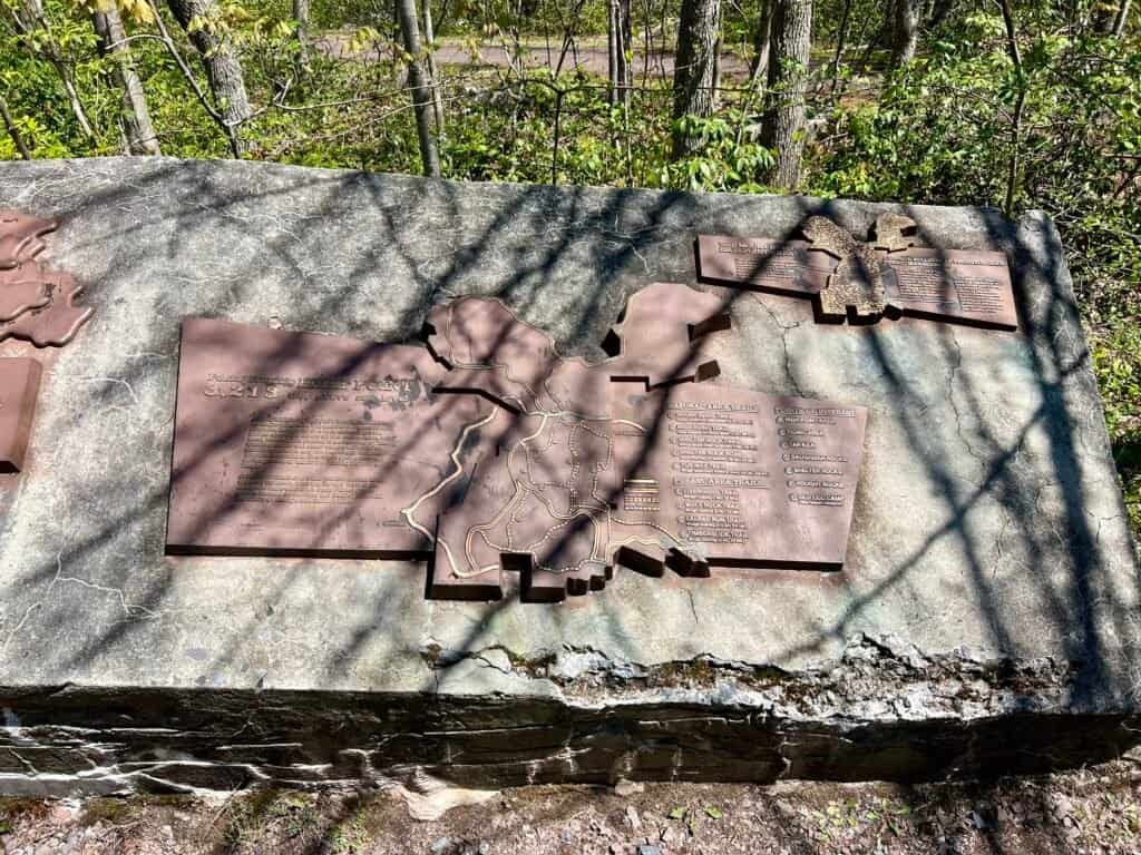 Mount Davis high point marker and trail map showing Pennsylvania’s highest elevation at 3,213 feet