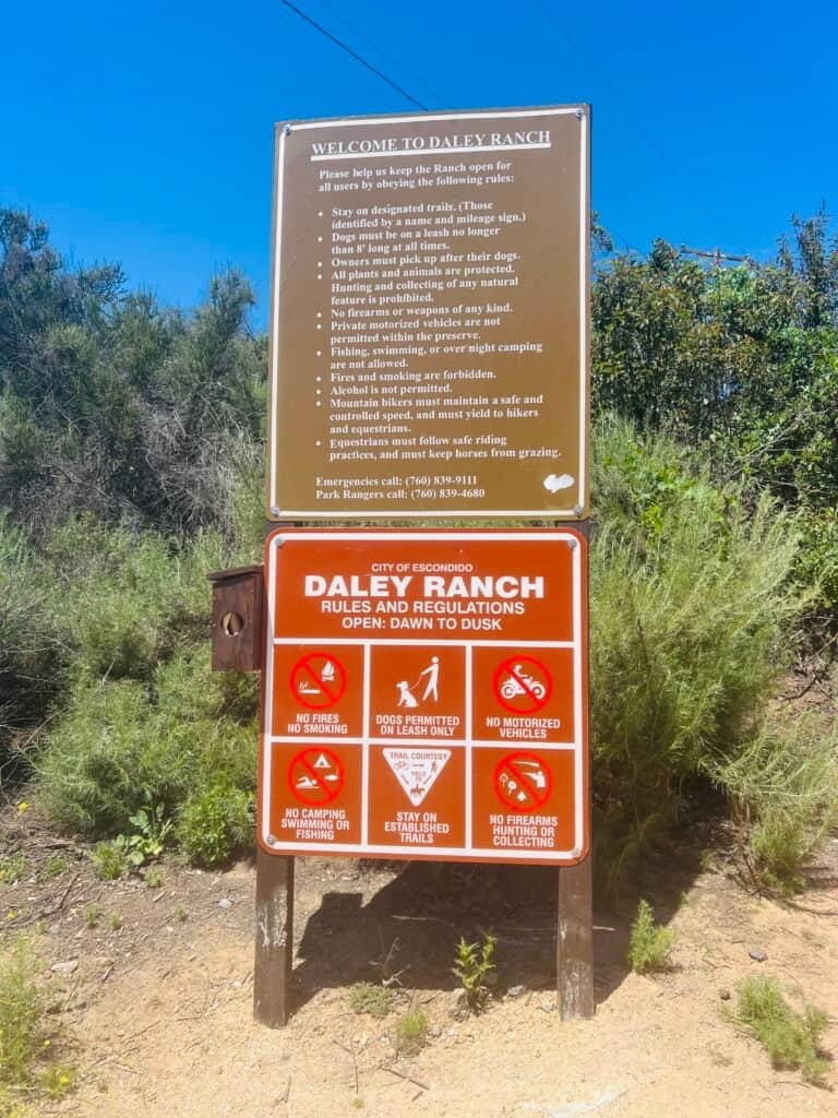 Daley Ranch rules and regulations sign listing trail use guidelines and restrictions at the park entrance.