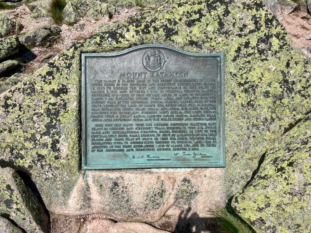 Mount Katahdin summit plaque embedded in rock at Baxter Peak