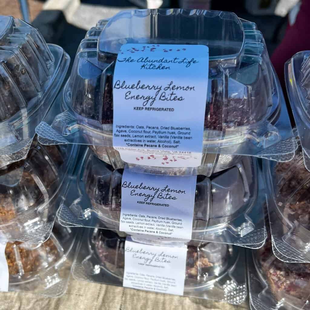 Packaged blueberry lemon energy bites from Abundant Life Kitchen displayed at the Lexington Virginia farmers market