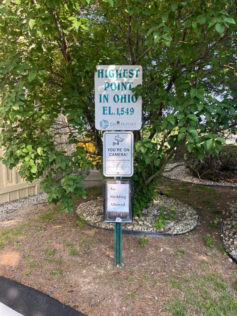 Highest Point in Ohio sign near the parking area at Campbell Hill, marking the short path to Ohio’s high point