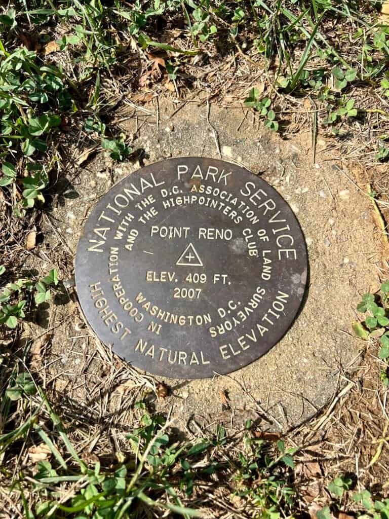 Point Reno survey marker showing elevation of 409 feet