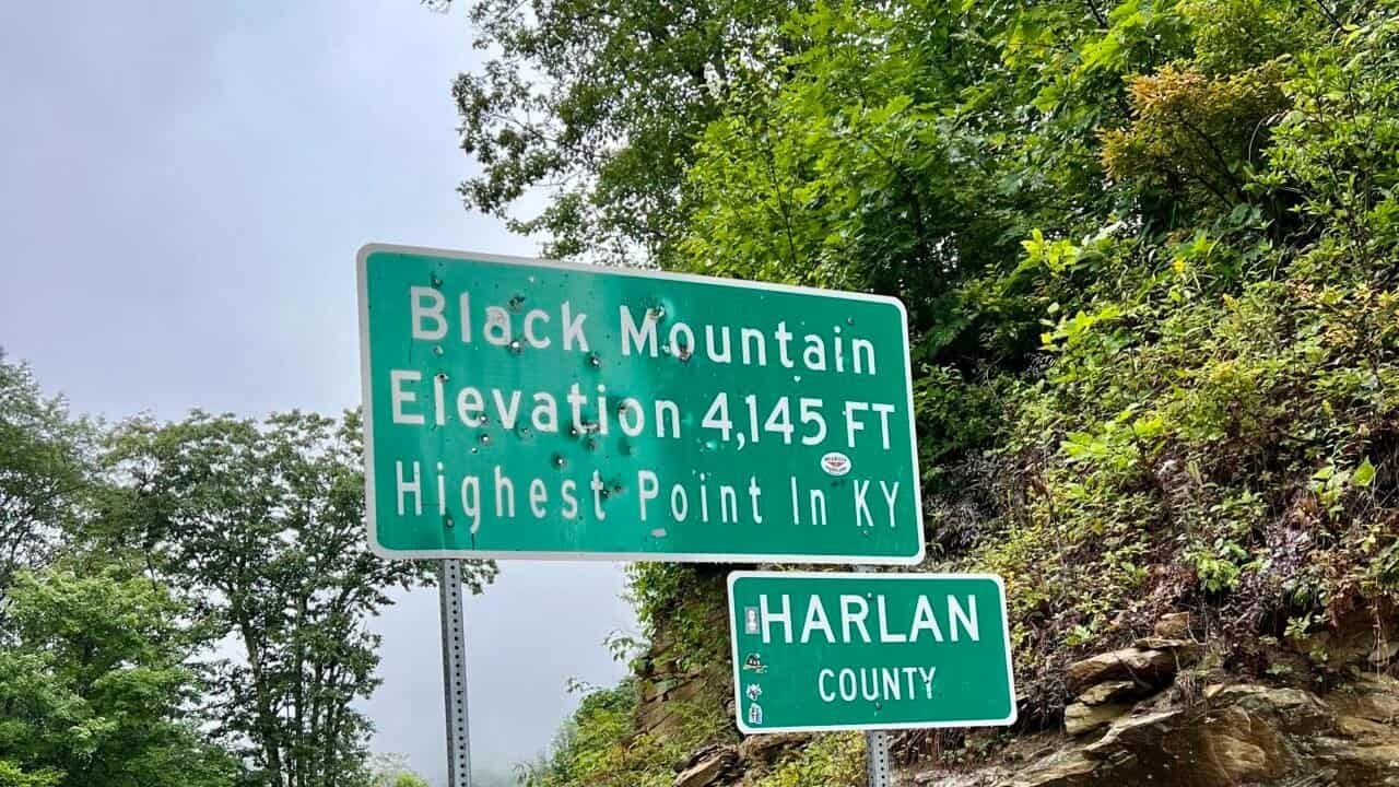 Road sign marking Black Mountain, Kentucky’s highest point at 4,145 feet in Harlan County