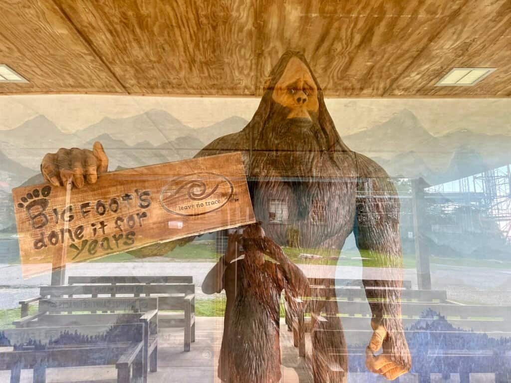 Life-size Bigfoot statue named Sully inside Cheaha State Park holding a “Leave No Trace” sign.