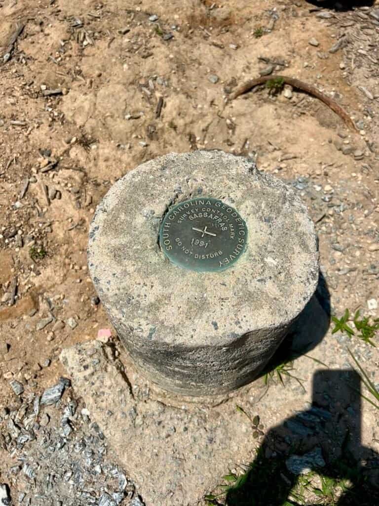 Geodetic survey marker marking the official high point of Sassafras Mountain in South Carolina