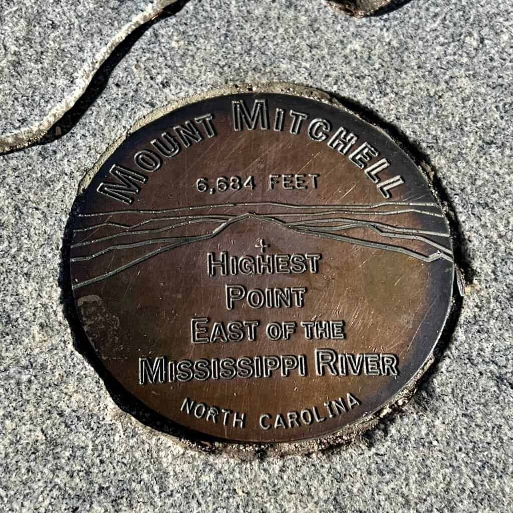 Bronze Mount Mitchell high point marker set into the summit stone