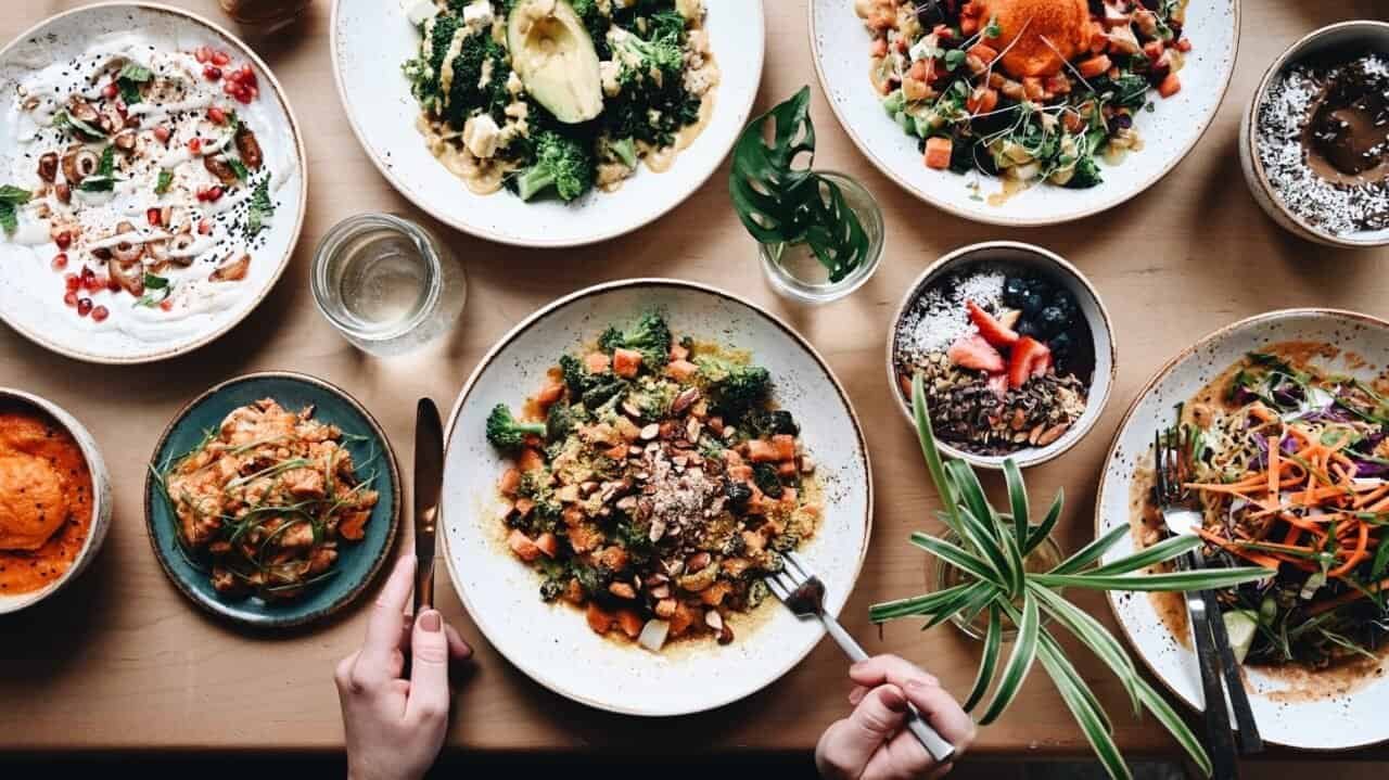 Assorted plant-based bowls and dishes at Life Alive Organic Café in Boston, Massachusetts
