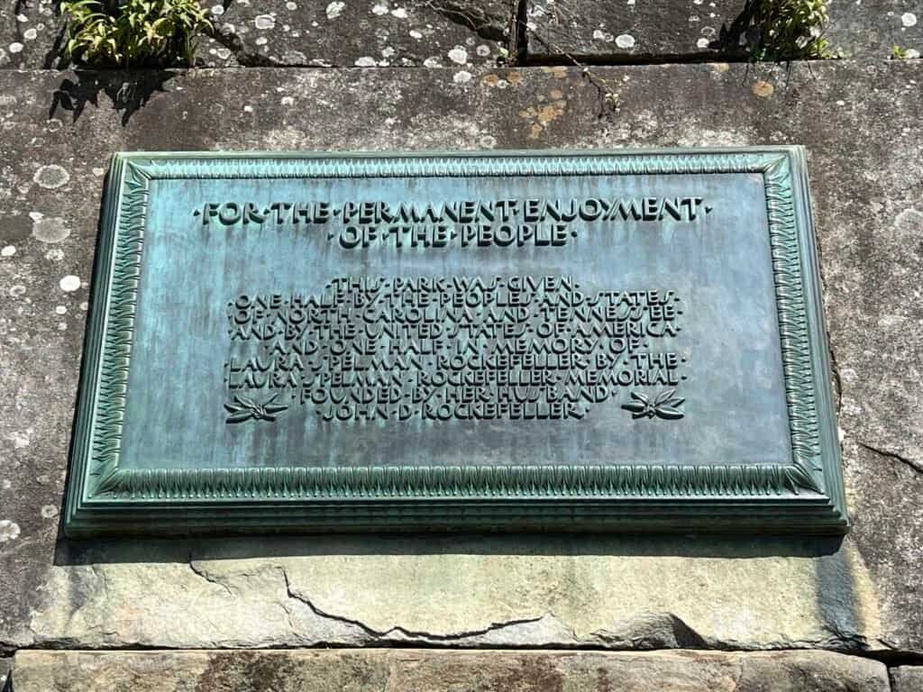 Plaque at Newfound Gap marking the Tennessee and North Carolina border in Great Smoky Mountains National Park