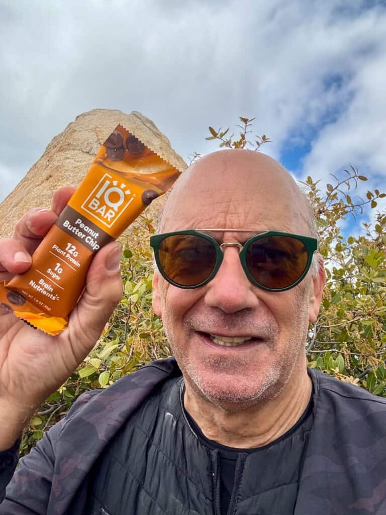 IQBar Peanut Butter Chip protein bar held during a hike on El Cajon Mountain