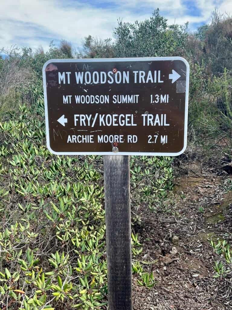 Trail sign showing Mount Woodson Trail and Fry Koegel Trail directions in Poway, California