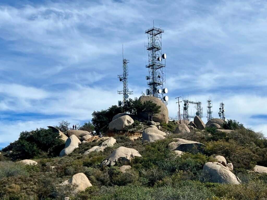 Radio towers on Mount Woodson summit visible from the hiking trail in Poway, California