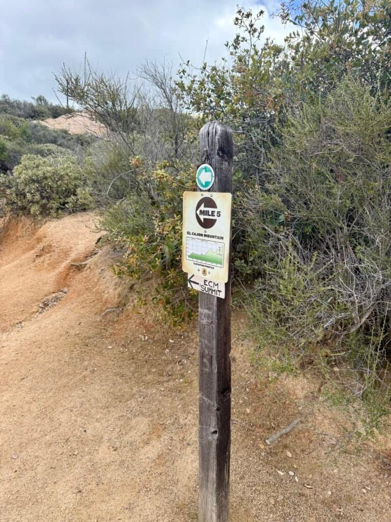 Mile 5 trail marker pointing toward El Cajon Mountain summit and final climb