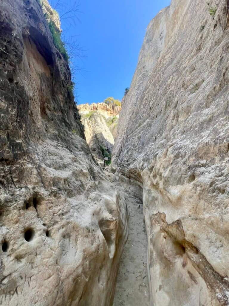 Sandstone walls narrowing further along the slot canyon in Annie’s Canyon