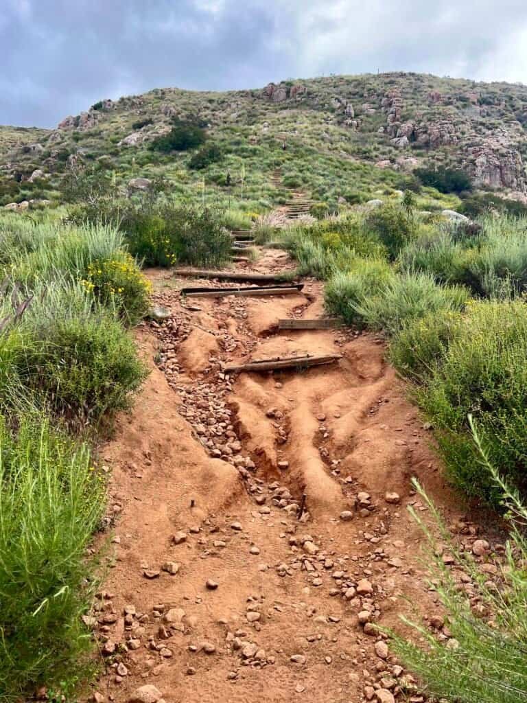 Close view of eroded stone and timber steps on the South Fortuna Trail climb in Mission Trails