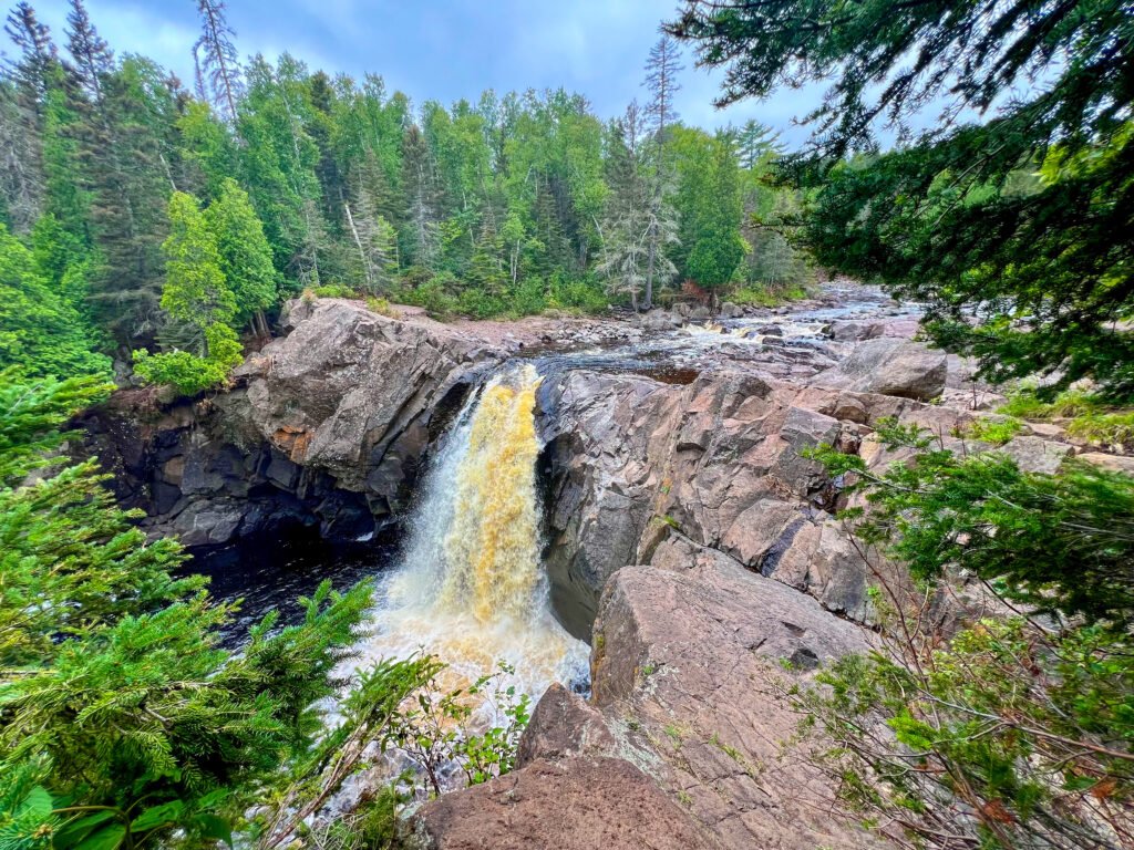 Illgen Falls and rocky riverbed along the Baptism River in Tettegouche State Park.