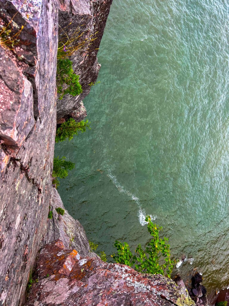 Looking straight down the cliffs at Shovel Point to the waters of Lake Superior in Tettegouche State Park.