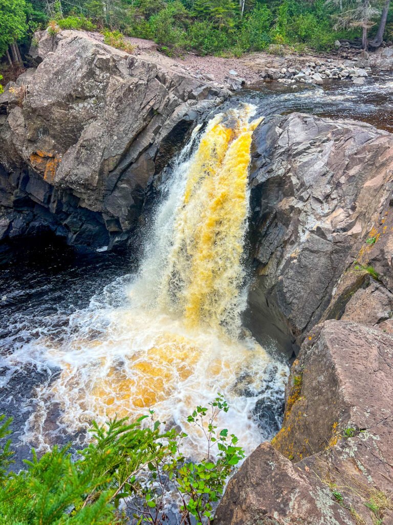 Close-up view of Illgen Falls plunging into the rocky gorge below in Tettegouche State Park.