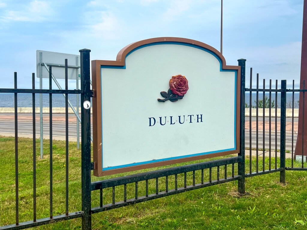 Duluth sign along Lake Superior shoreline on Minnesota’s North Shore.