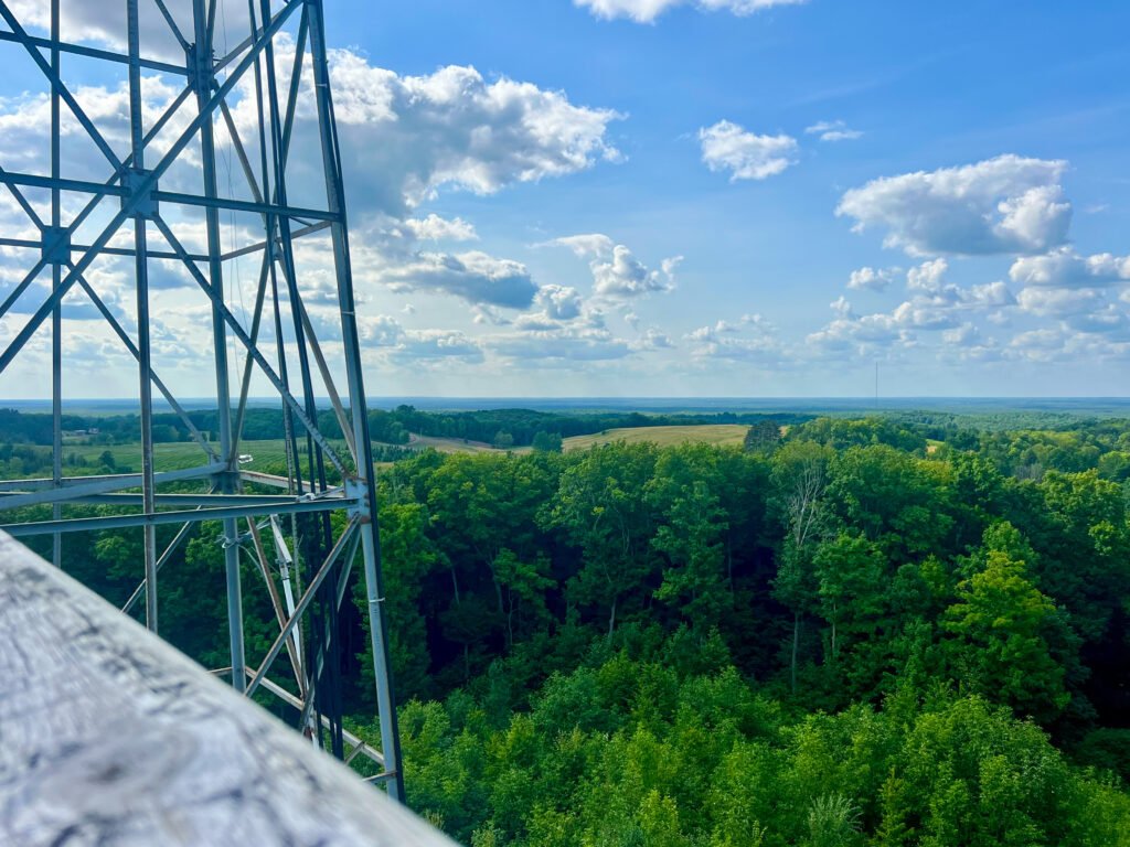 Panoramic view from Timms Hill fire tower overlooking forests and rolling hills in Wisconsin.