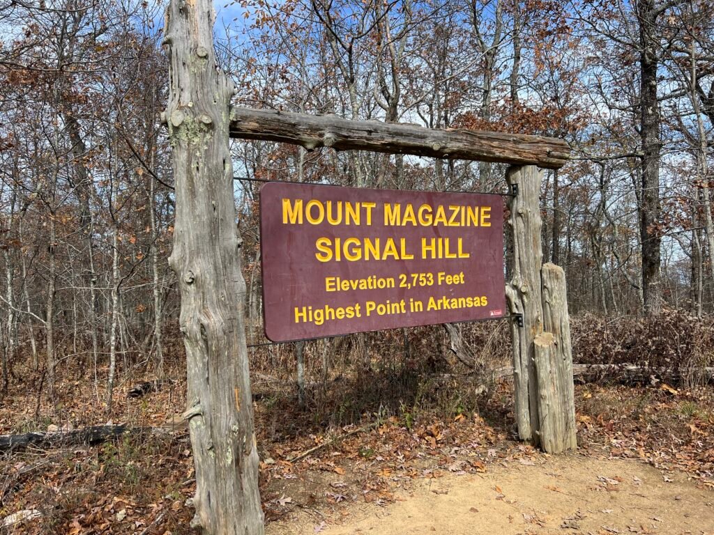 Wooden sign at Mount Magazine Signal Hill marking elevation 2,753 feet, the highest point in Arkansas.