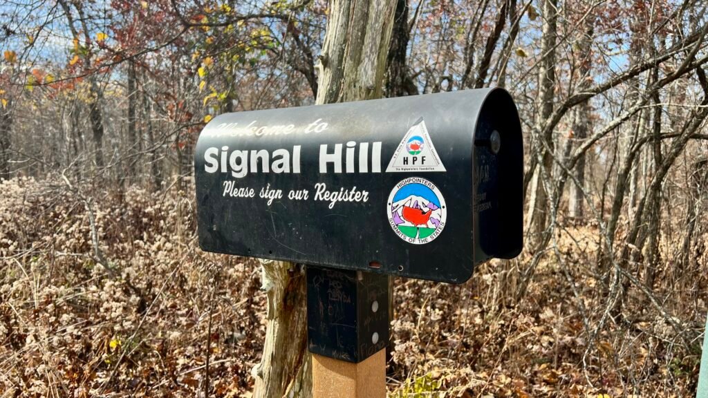 Highpointers Club register mailbox at Signal Hill summit on Mount Magazine.