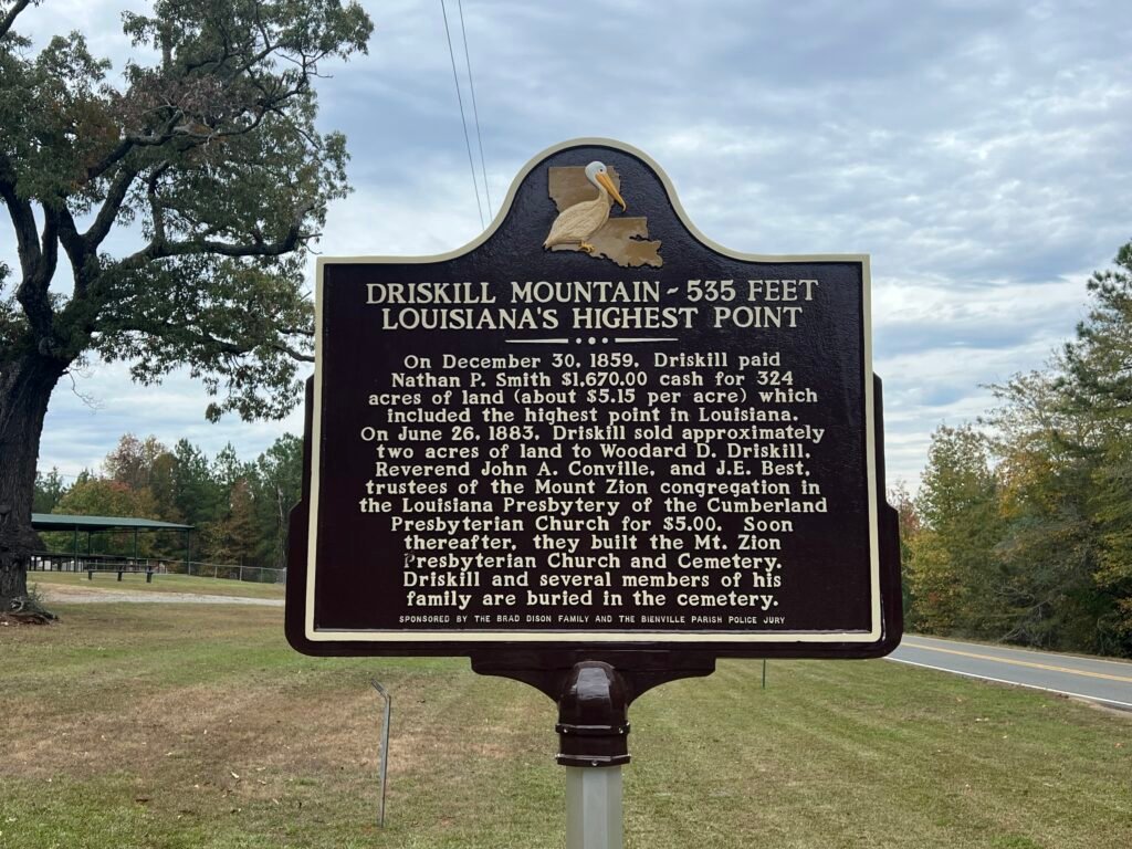 Louisiana historical marker for Driskill Mountain noting 535 feet as the state’s highest point near Mt. Zion Presbyterian Church