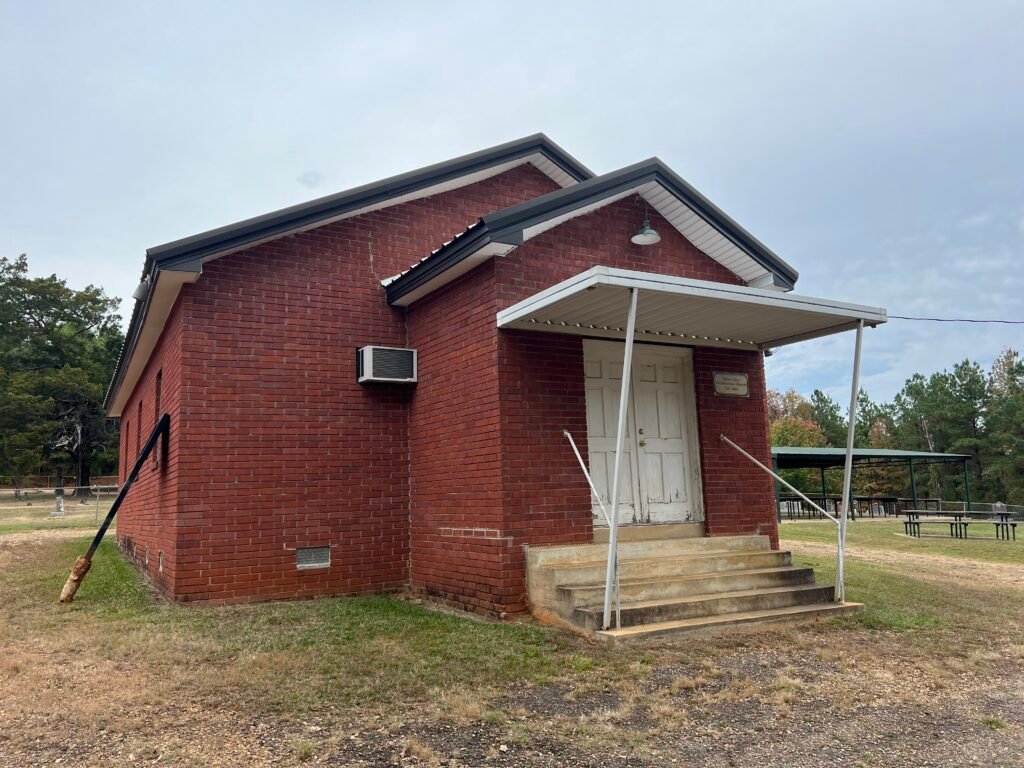 Small red-brick Mt. Zion Presbyterian Church building near the Driskill Mountain trailhead in rural Louisiana.