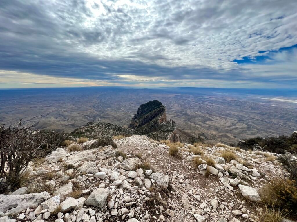 El Capitan viewed from Guadalupe Peak summit with desert plains stretching beyond