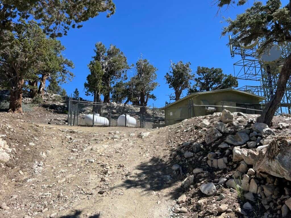 Communications equipment and utility tanks near Bertha Peak summit