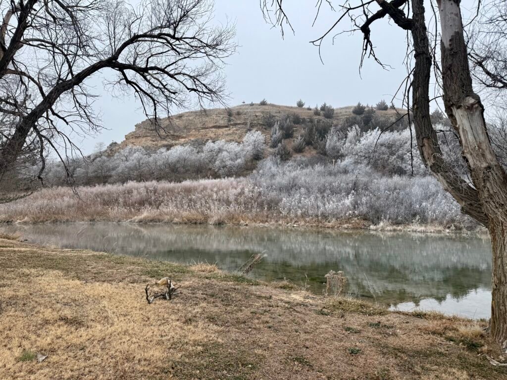 Frost-covered bluff and creek near Big Springs at Lake Scott in western Kansas.