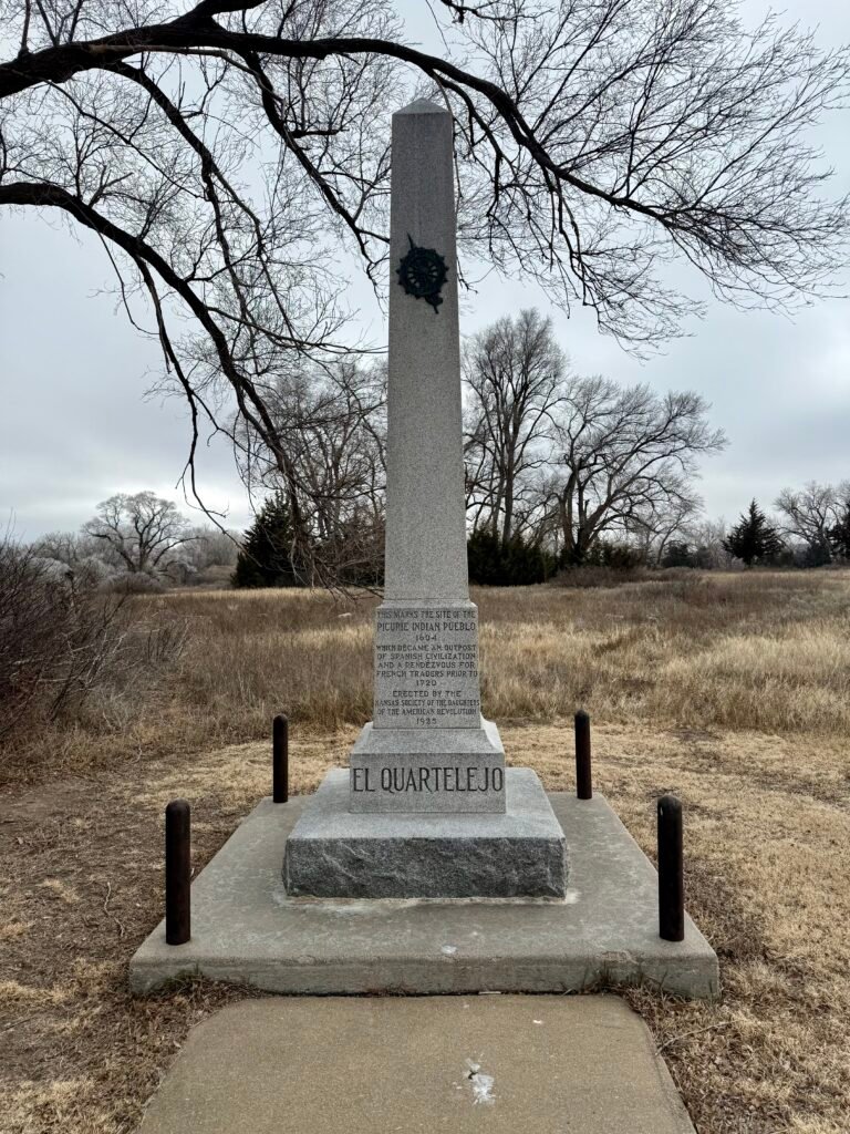 Stone obelisk monument marking the historic site of El Cuartelejo Pueblo in western Kansas.