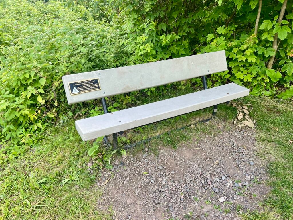 Highpointers Foundation bench at the summit of Timms Hill in Wisconsin.