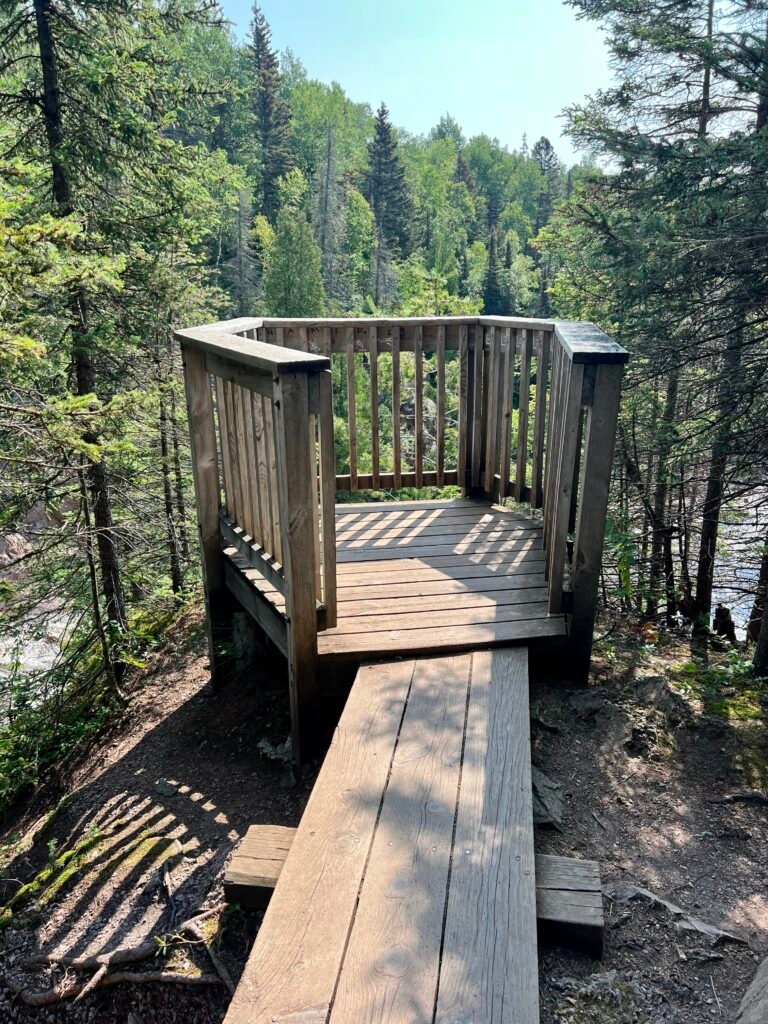 Small wooden overlook platform above High Falls along the Baptism River in Tettegouche State Park.